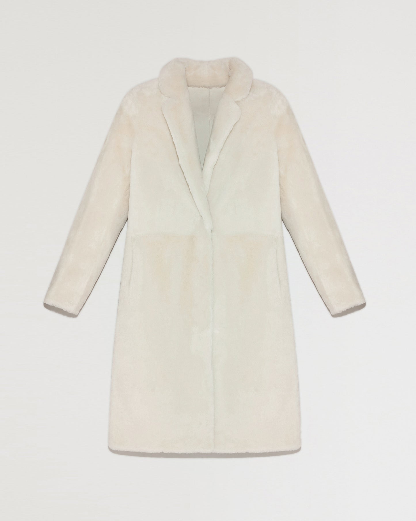 Reversible merino shearling coat