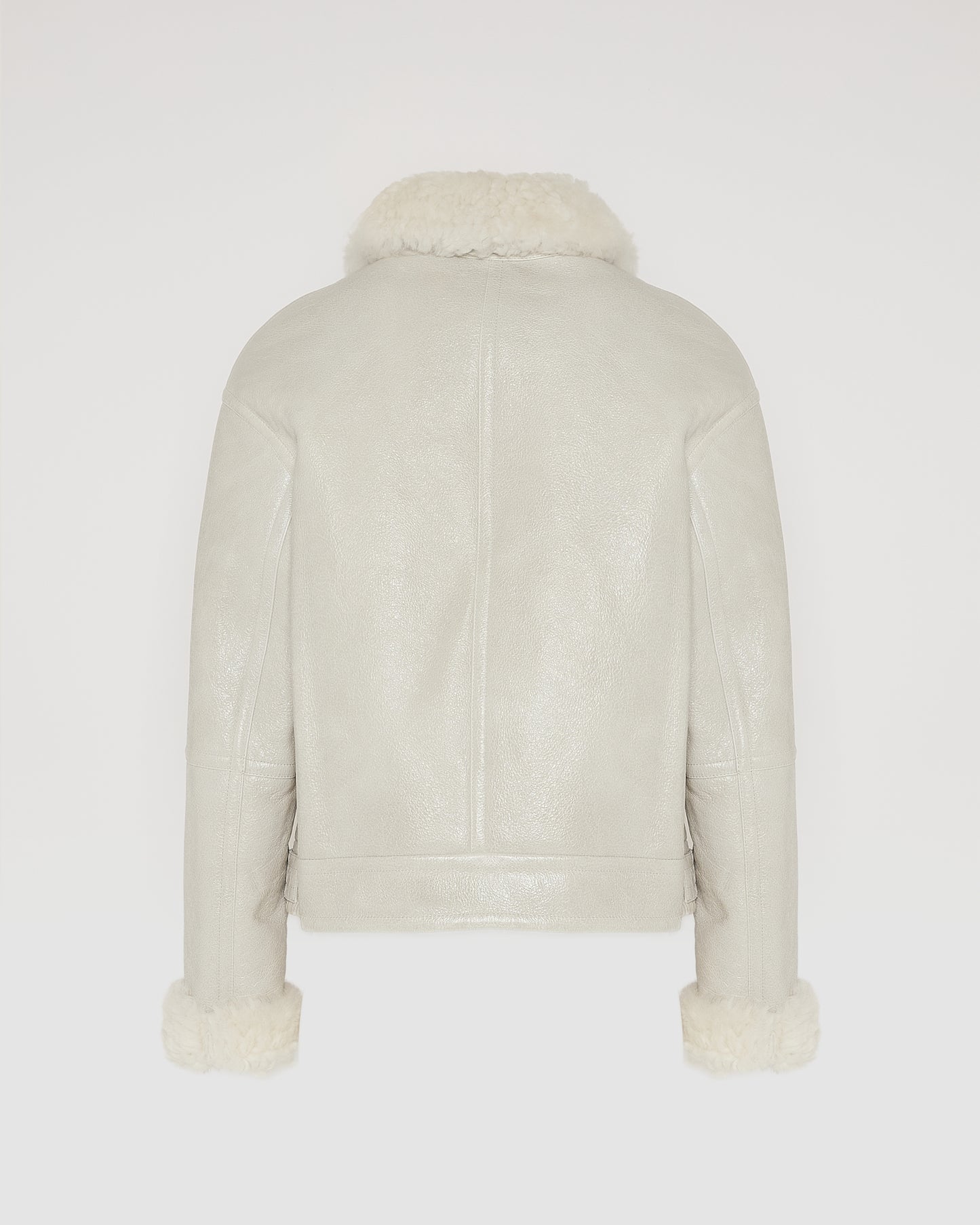 Soldes d'hiver - Yves Salomon -Veste courte en peau lainée d'agneau de Toscane curly avec finition vintage