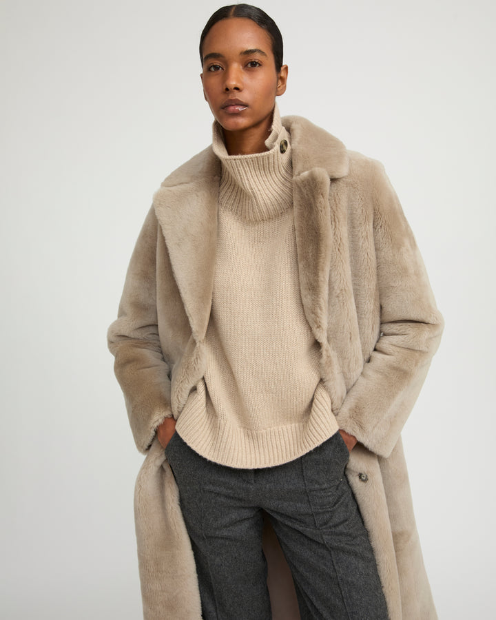 Long reversible belted shearling coat