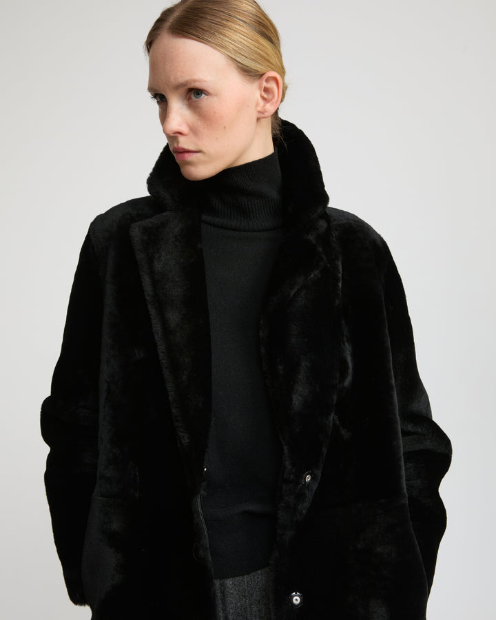 Reversible merino shearling coat