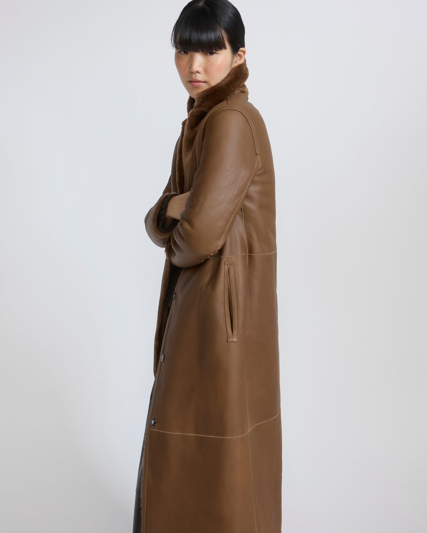 Manteau long réversible en peau lainée d'agneau