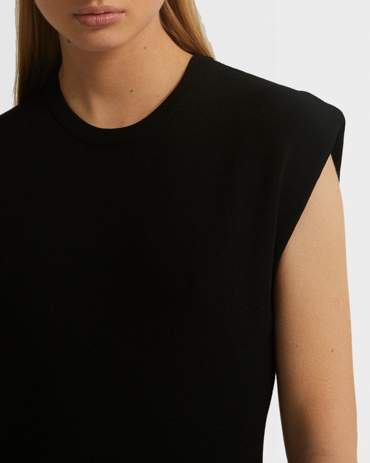 Sleeveless stretch knit mini dress - black
