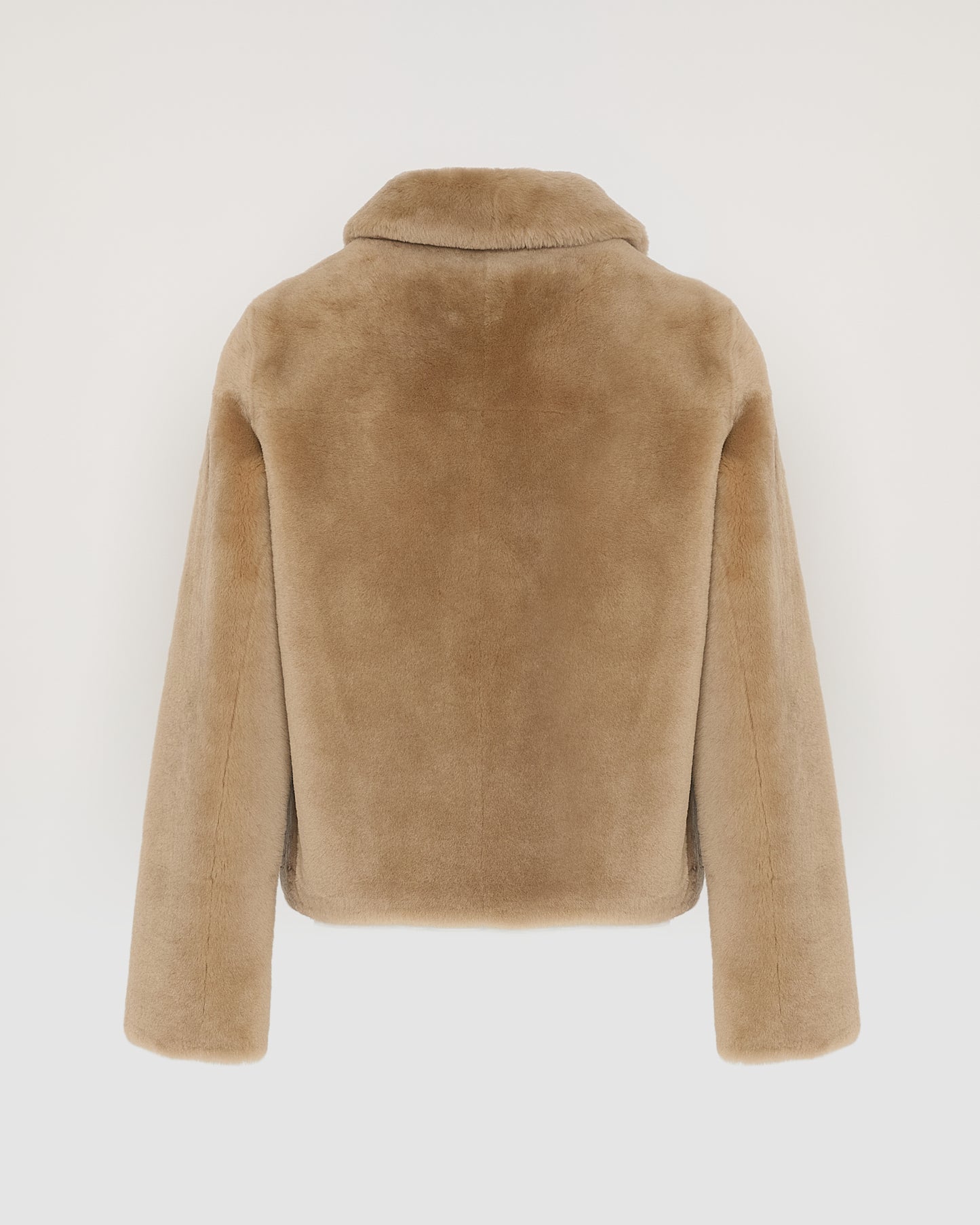 Short reversible jacket in merino lambskin