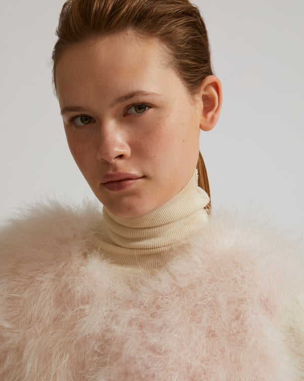 Gilet court en plumes