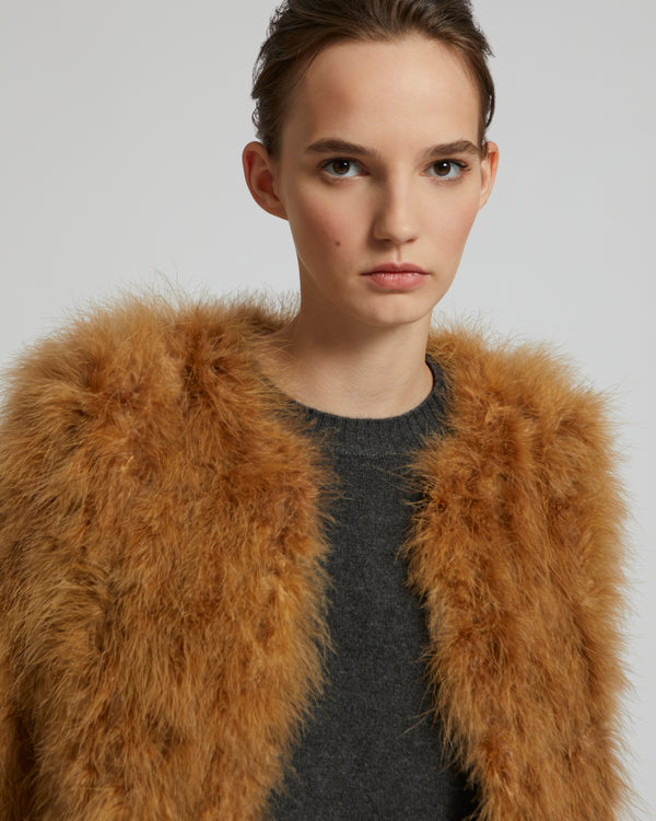 Veste courte en plumes