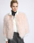 Veste courte en plumes