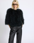 Veste courte en plumes