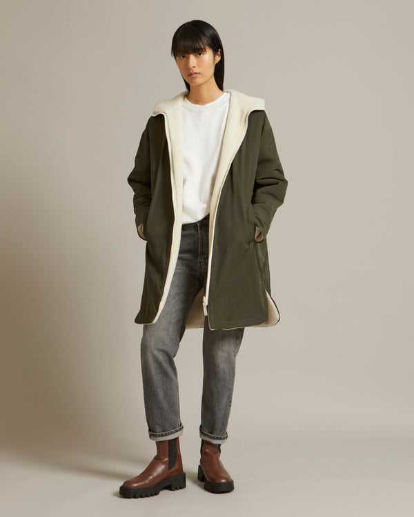 Parka réversible en tissu technique déperlant et peau lainée mérinillo