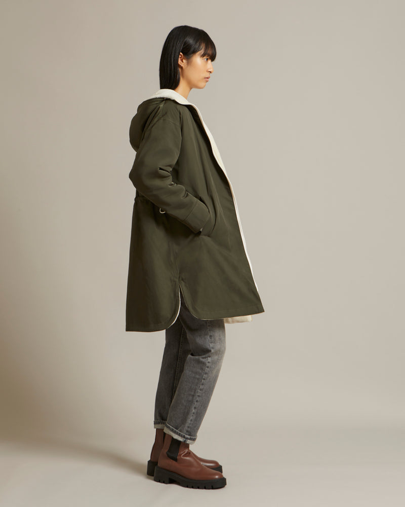 Parka réversible en tissu technique déperlant et peau lainée mérinillo