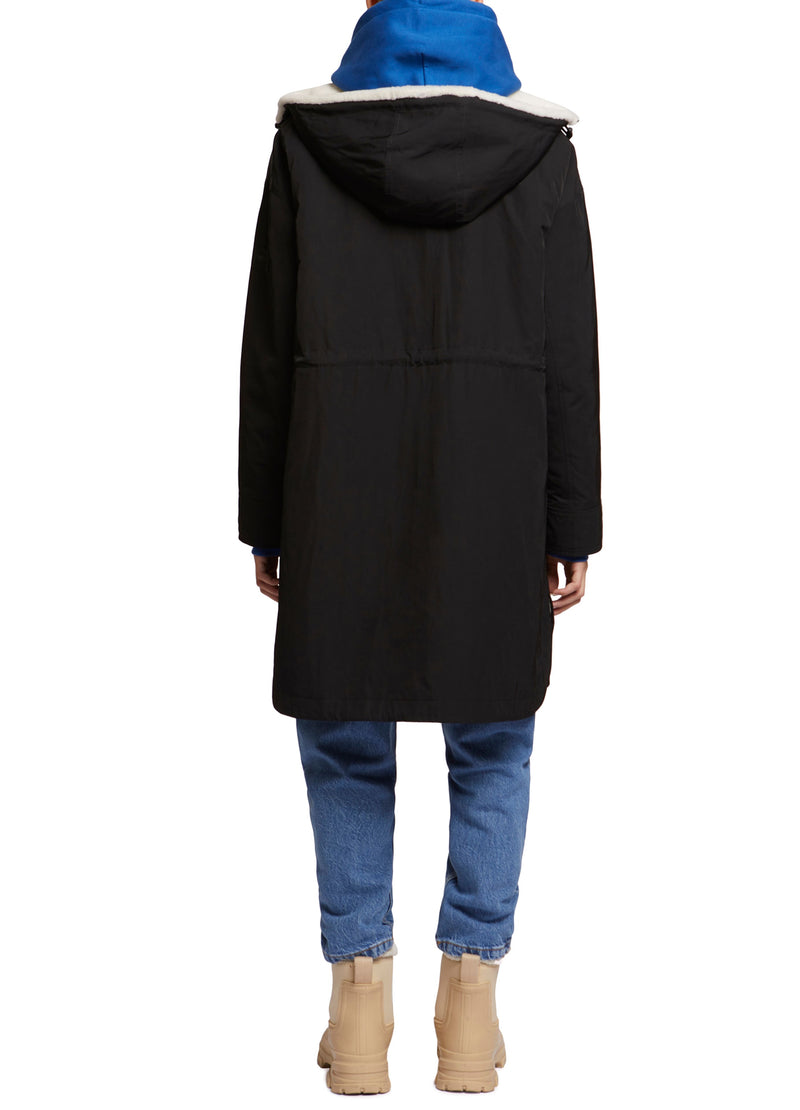 Parka réversible en tissu technique déperlant et peau lainée mérinillo