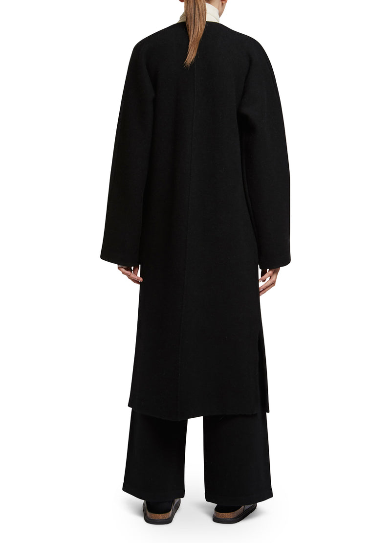 Cardigan long en maille avec sur-poches en fourrure de vison