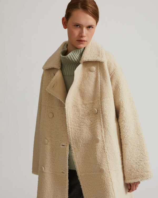 Manteau à double boutonnage en agneau mérinillo