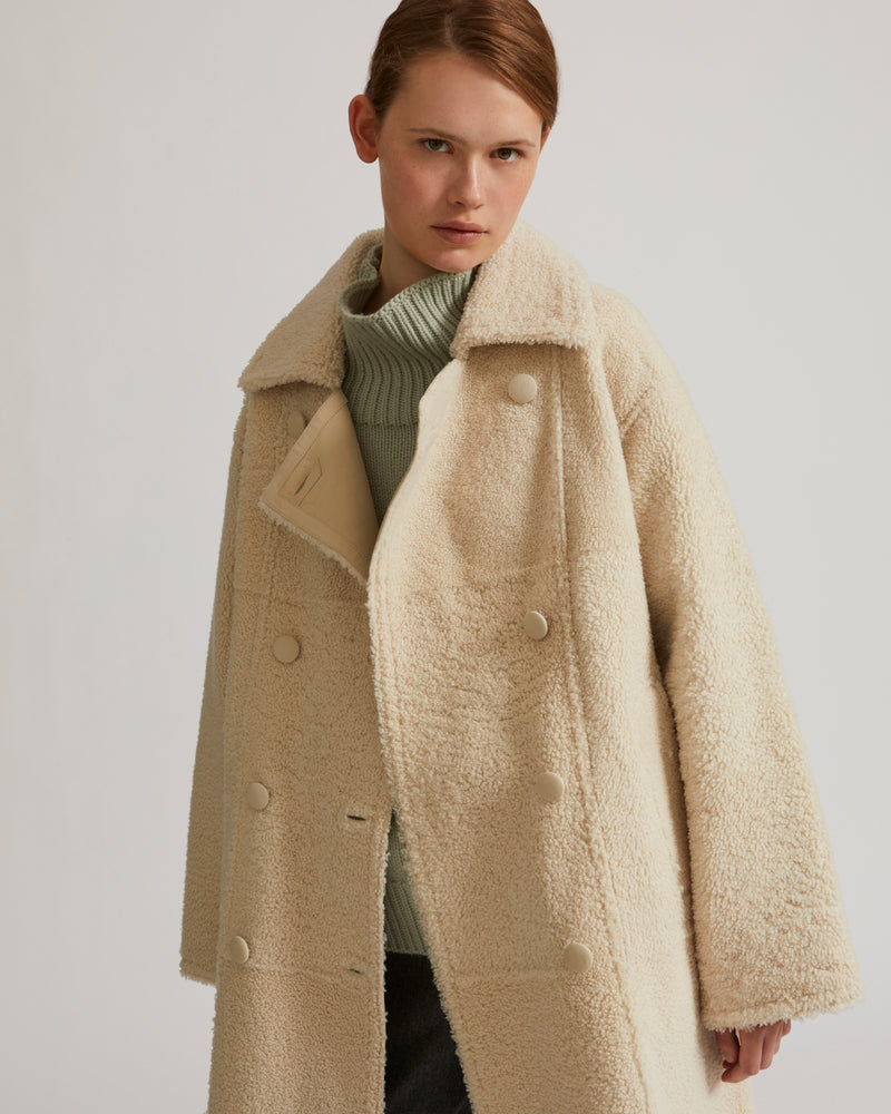 Manteau à double boutonnage en agneau mérinillo