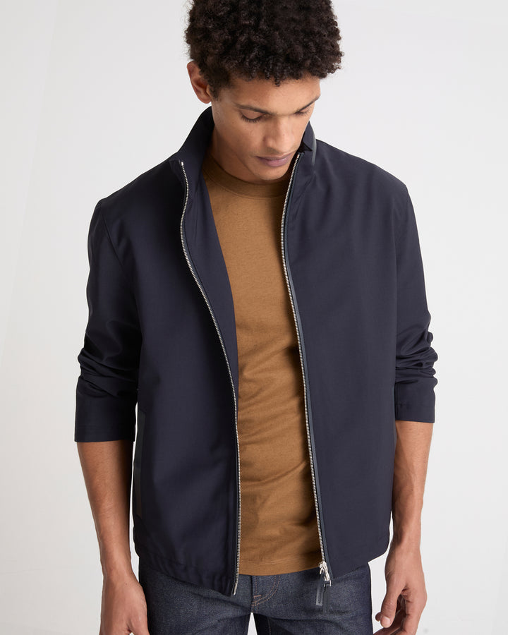 Veste imperméable en jersey avec détails en cuir et capuche