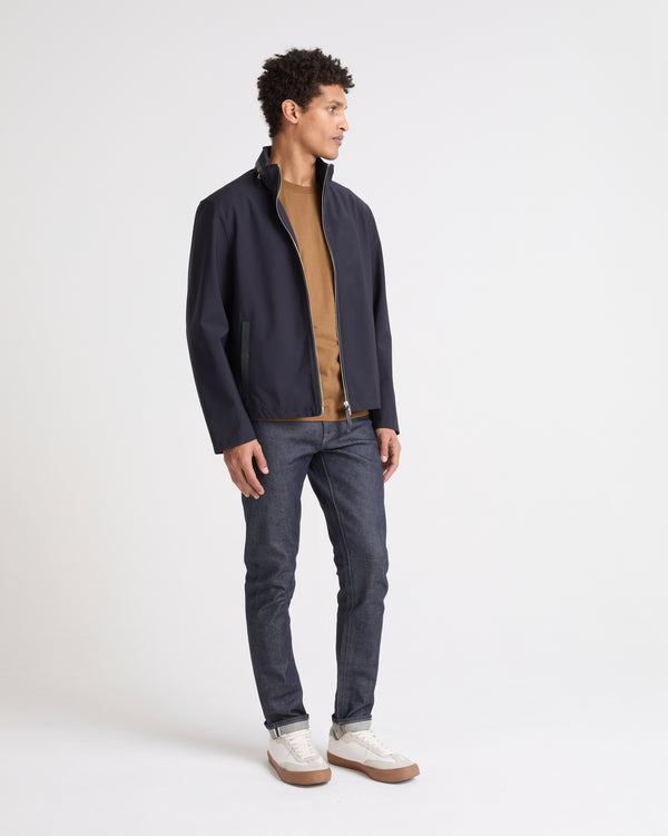Veste imperméable en jersey avec détails en cuir et capuche