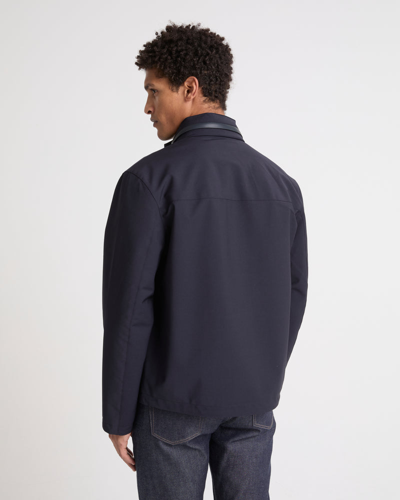 Veste imperméable en jersey avec détails en cuir et capuche