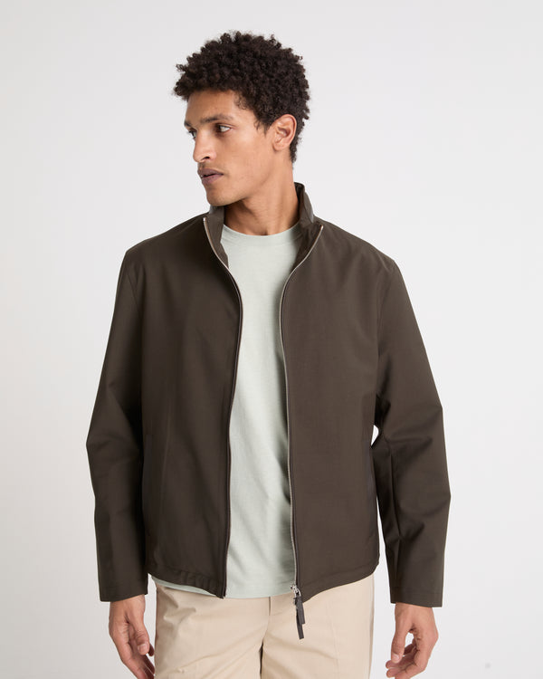 Veste imperméable en jersey avec détails en cuir et capuche