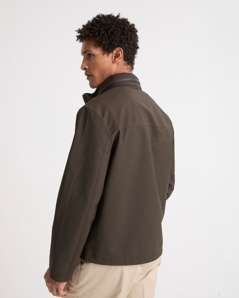 Veste imperméable en jersey avec détails en cuir et capuche