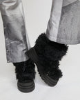 Ankle boots in leather and Lacon shearling