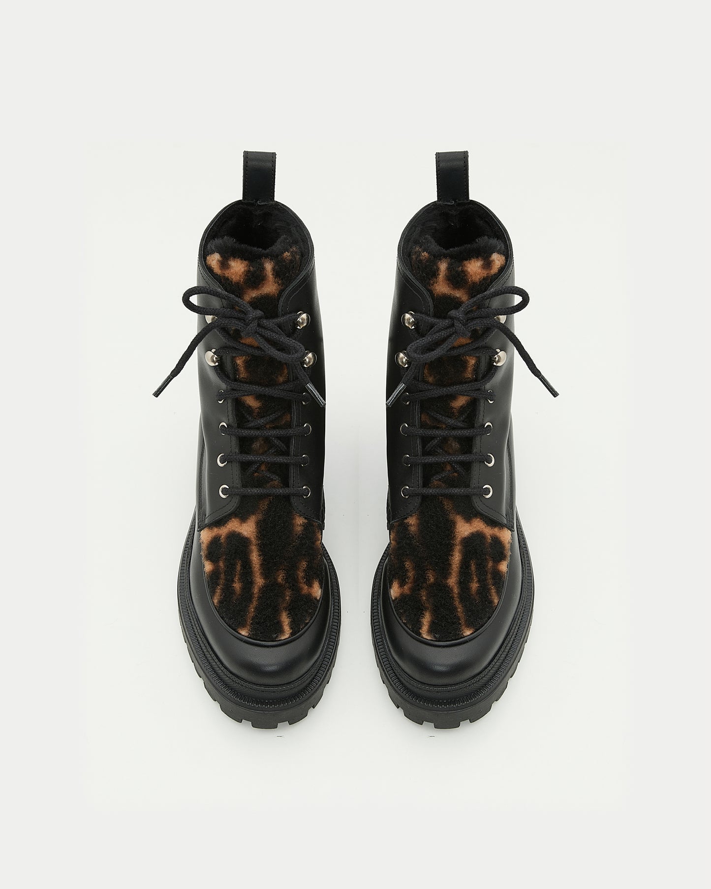 Ankle boots in leather and Lacon shearling