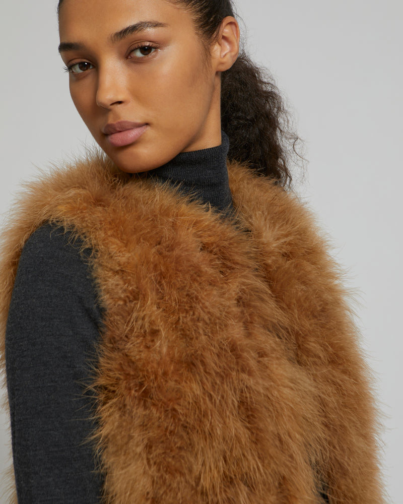 Gilet long en plumes