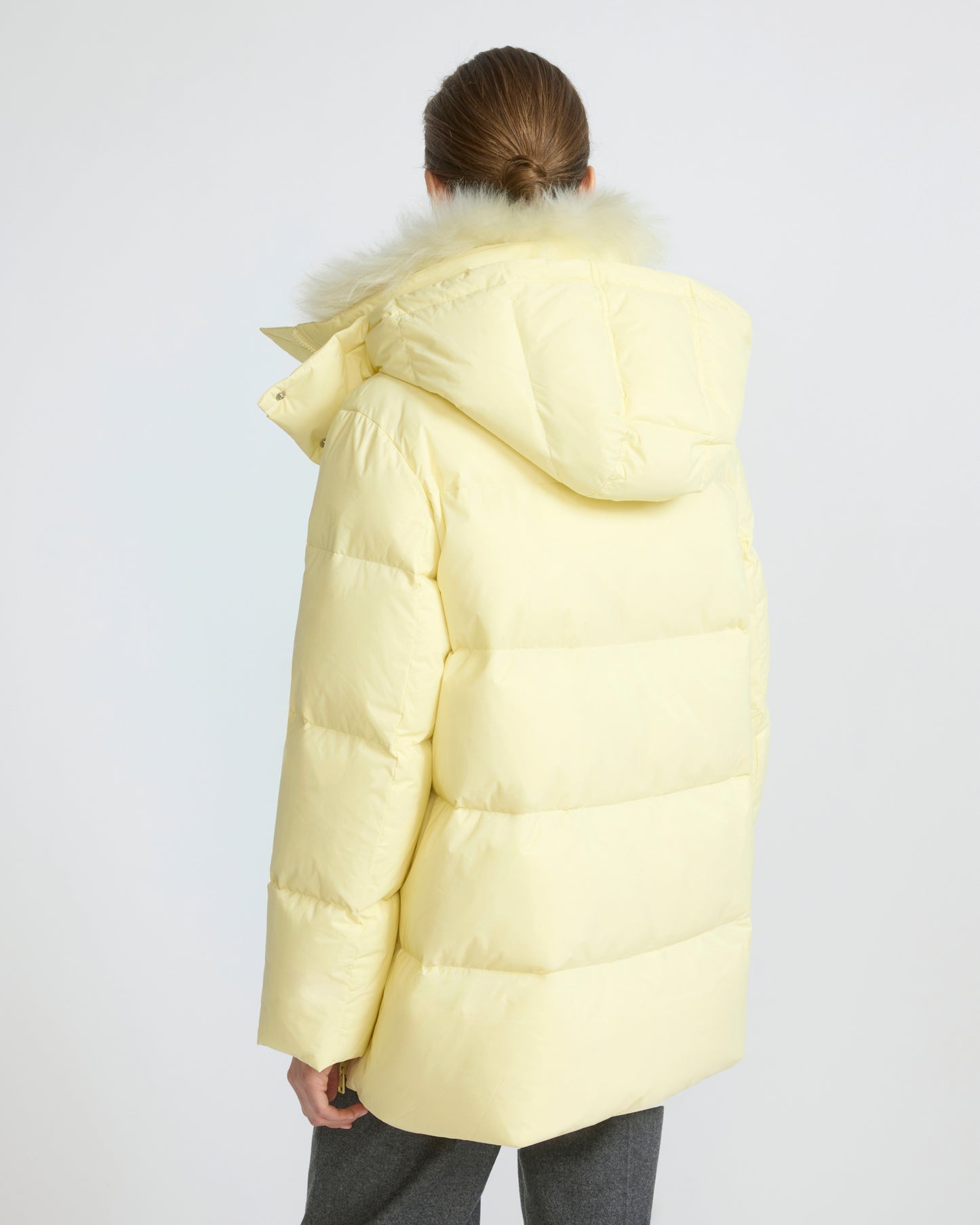 A-line down jacket in waterproof technical fabric with airy lambswool trim
