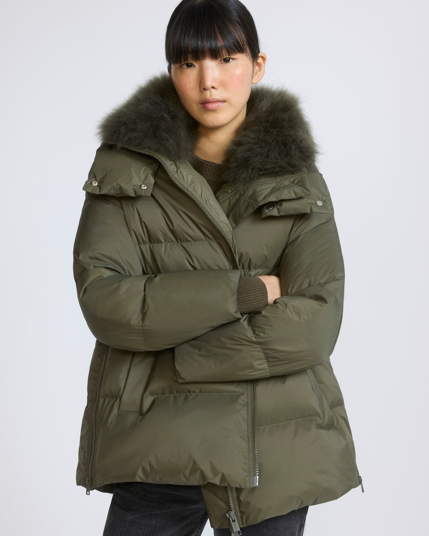 A-line down jacket in waterproof technical fabric with airy lambswool trim