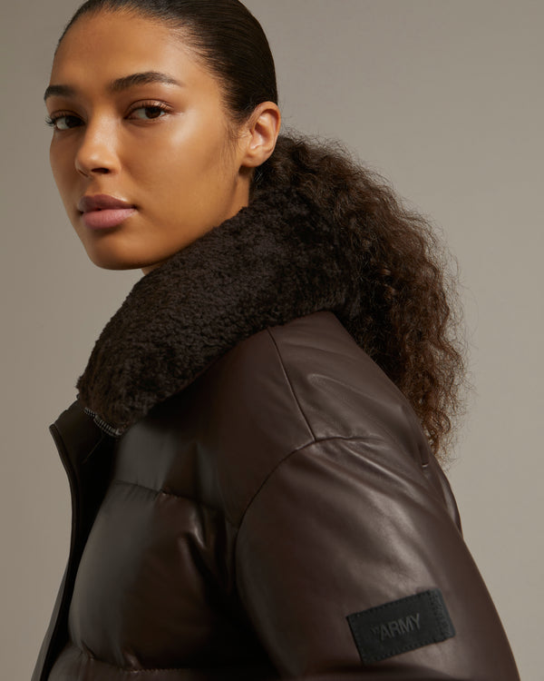 Down jacket in lamb leather with shearling collar