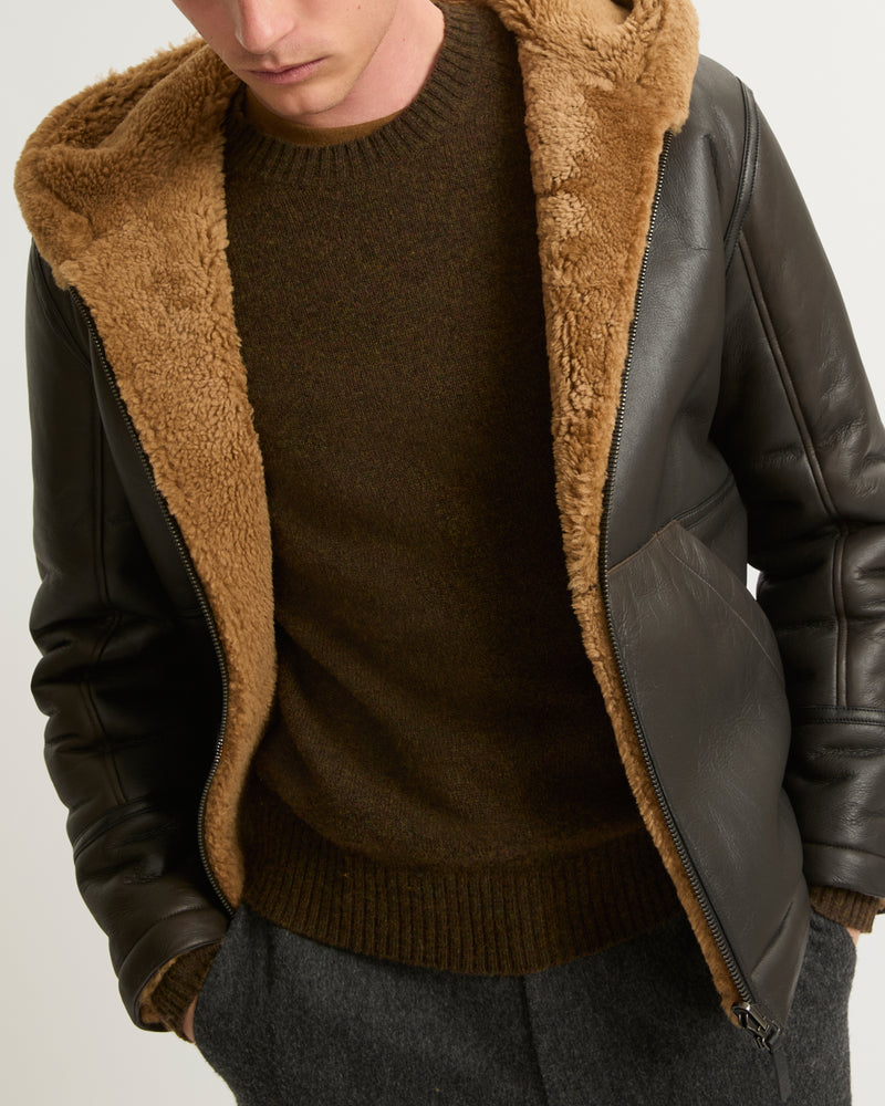 Blouson à capuche en peau lainée réversible