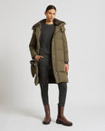 Doudoune longue en tissu technique imperméable et col en fourrure de vison
