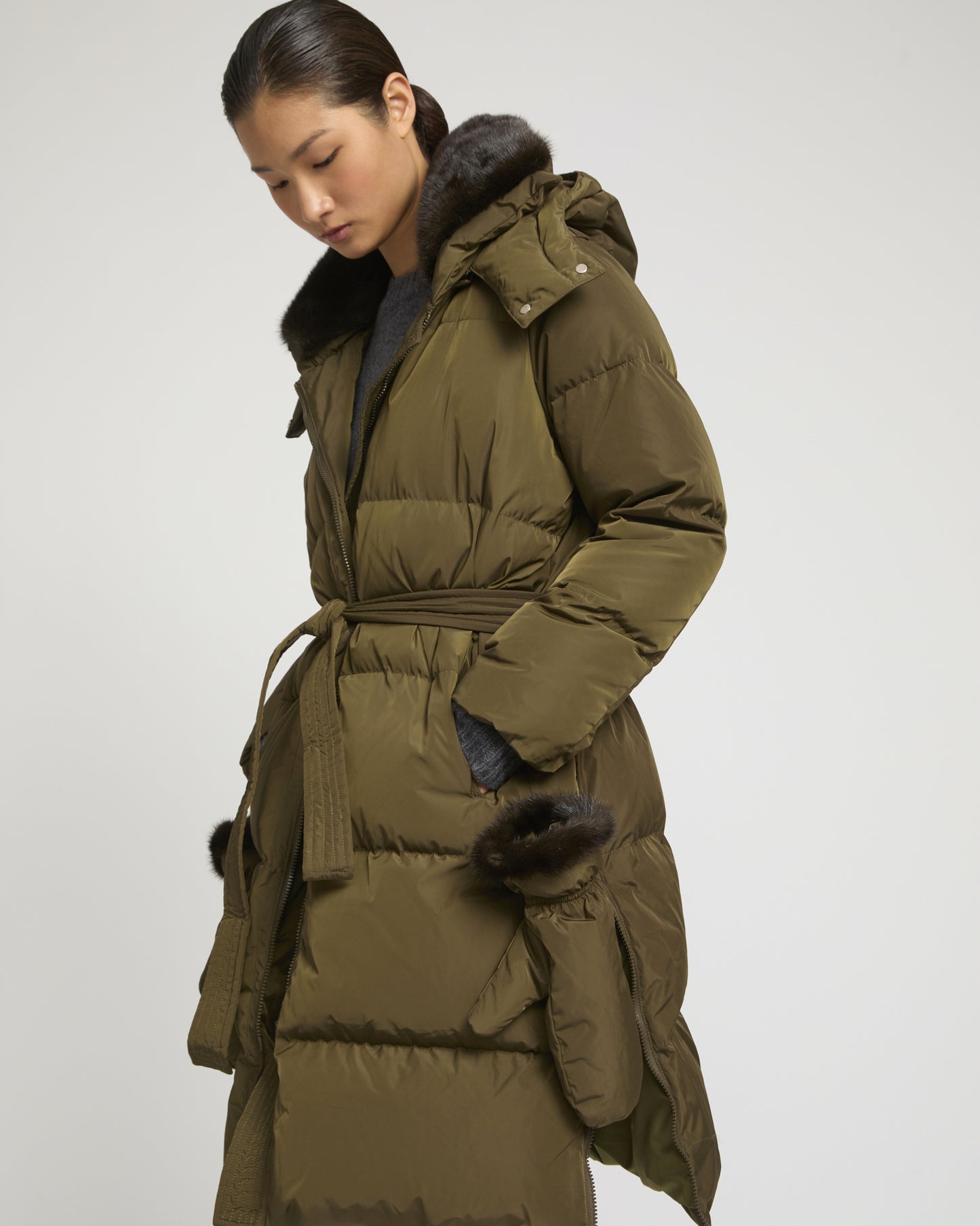 Long belted down jacket in technical fabric
