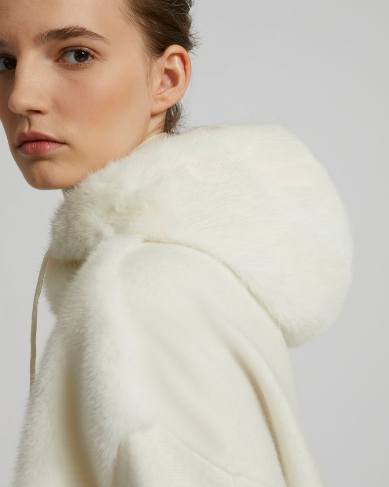 Hooded jacket in knit and mink fur
