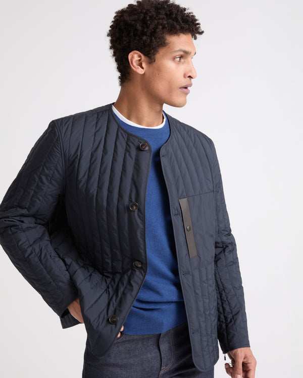Surchemise matelassée en tissu technique imperméable