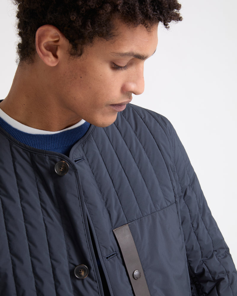 Surchemise matelassée en tissu technique imperméable