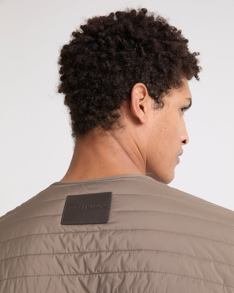 Surchemise matelassée en tissu technique imperméable