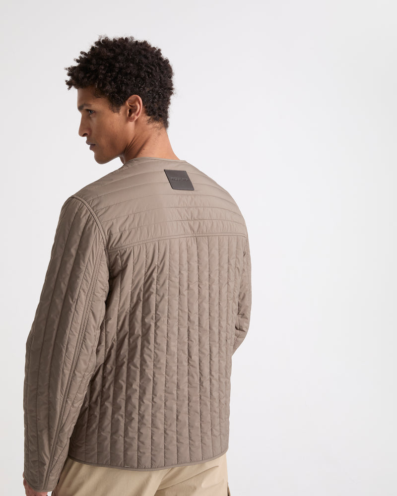 Surchemise matelassée en tissu technique imperméable