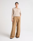 Pleated trousers in cotton-linen fabric