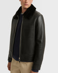 Veste en cuir avec col en peau lainée