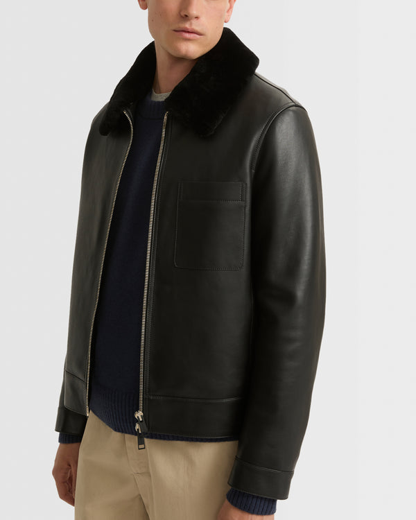 Veste en cuir avec col en peau lainée