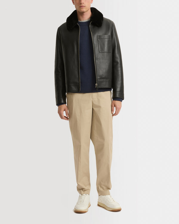 Veste en cuir avec col en peau lainée