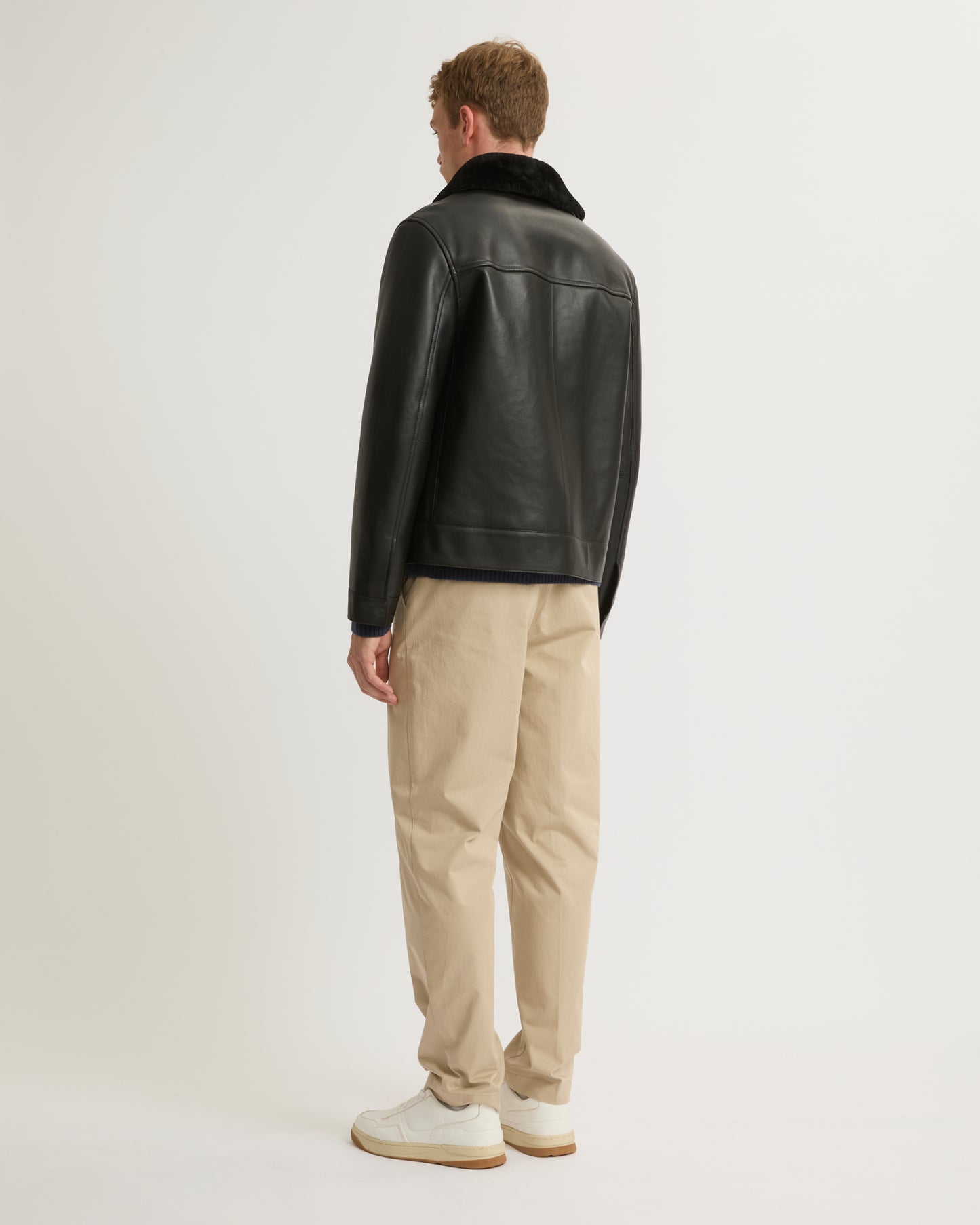 Veste en cuir avec col en peau lainée