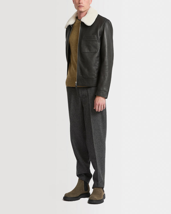 Veste en cuir avec col en peau lainée