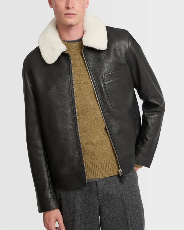 Veste en cuir avec col en peau lainée