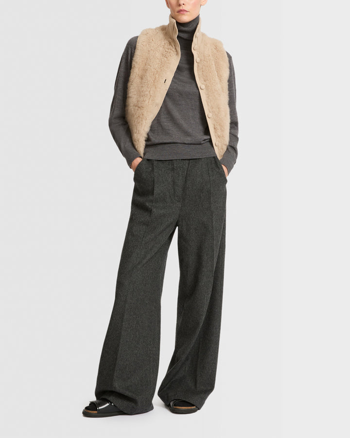 Gilet court en agneau mérinos frisé sur maille