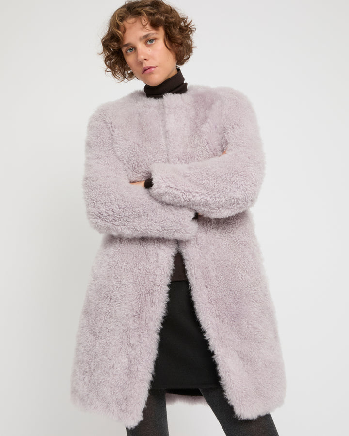 Coat in merino knit and lambskin