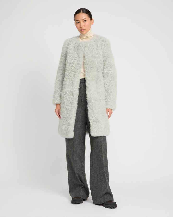 Coat in merino knit and lambskin