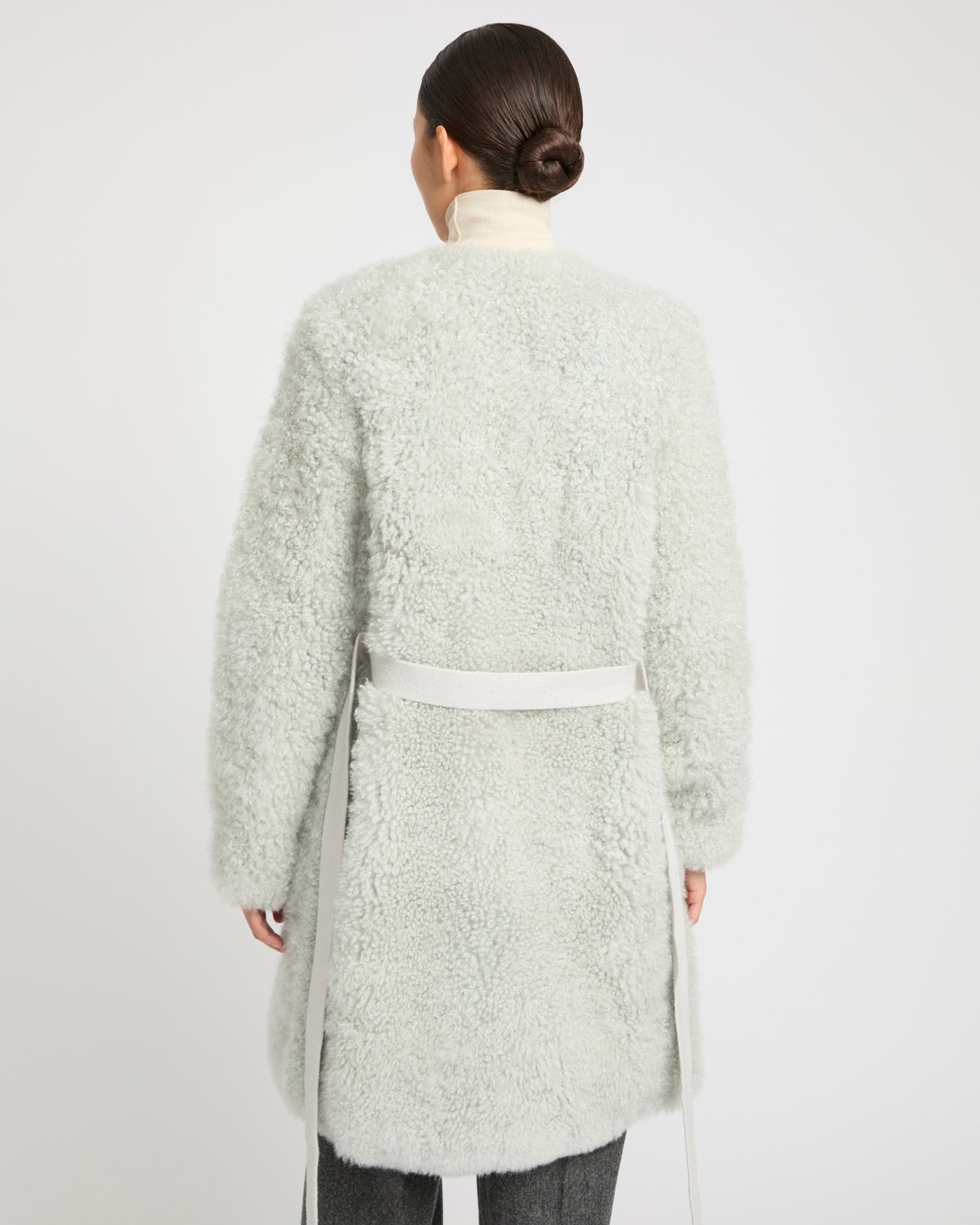 Coat in merino knit and lambskin
