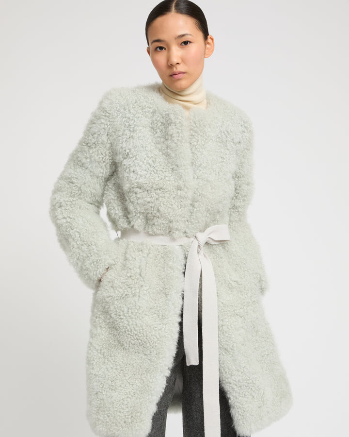 Coat in merino knit and lambskin