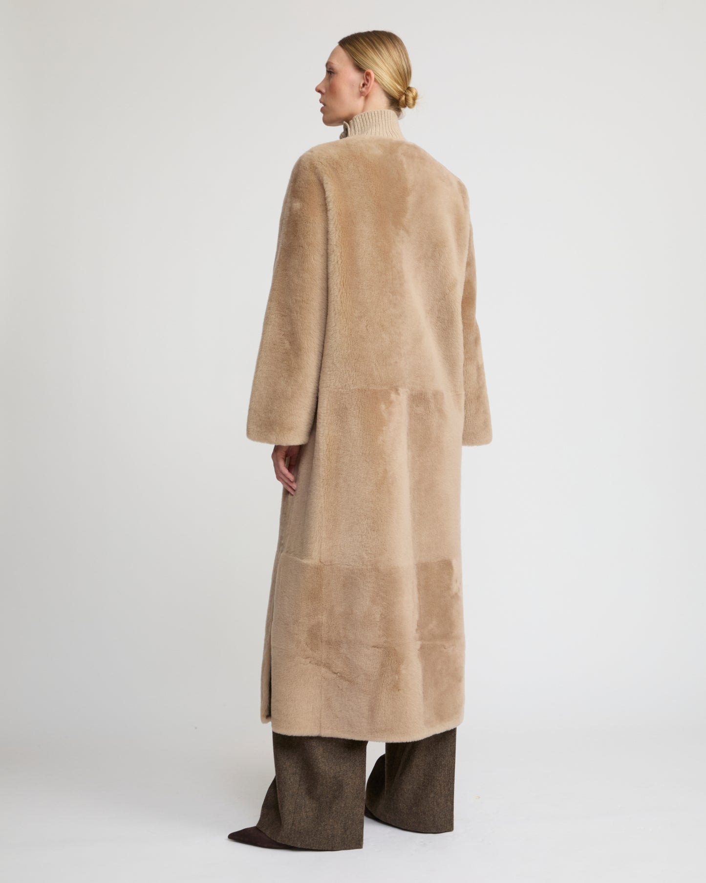Extra long draped lambskin shearling coat
