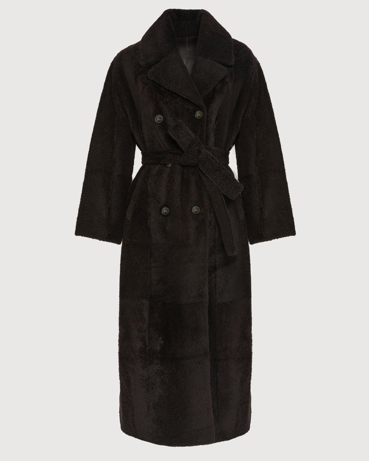 Manteau long à double boutonnage en peau lainée agneau façon astrakan